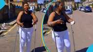 Elderly Ghanaian woman advises persons abroad not to overwork, touching video sparks reactions: "I now use crutches"
