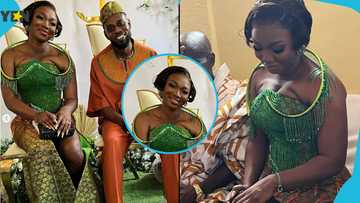 Ghanaian bride looks stunning in corseted kente gown with skintight round metallic sleeve