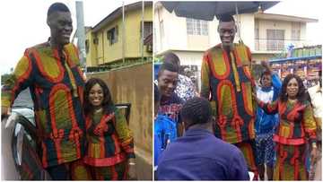 'Tallest man' steps out in matching outfit with female friend (Photos)