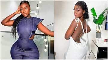 "Body mu promax": Hajia Bintu poses in skimpy crop top as she shows off posh Benz, fans wowed by her shape