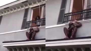 Man cheating with pretty lady hides on roof as husband 'storms' house in video