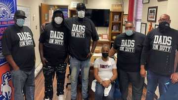 Fathers form "dads on duty" group to help stop violence at their children's high school