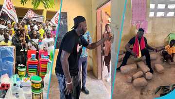 Medikal donates tables and chairs to school where pupils sit on stones, videos warm hearts