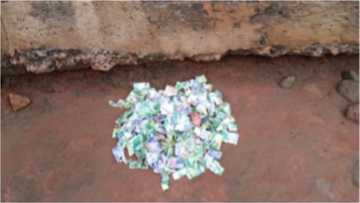 Honest man finds thousands of cedis behind his window at Techiman; calls police to come for it
