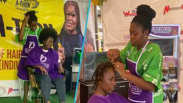 Chelsea-Abigail locks a client's hair while jamming to Pheelz's Finesse during her GWR lock-a-thon