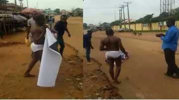 Shocking photos! Pastor caught sleeping with married woman. See what they did to him.