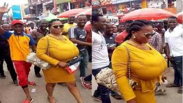 Photos: See how men are following this big-breasted woman around town