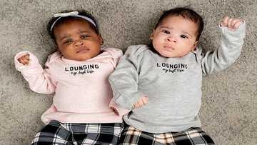 Happy mum gives birth to twins with different skin colour