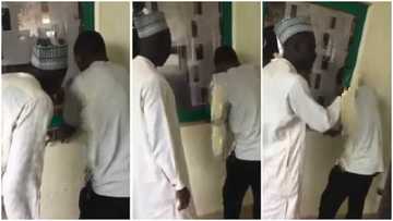 Video drops as 'serious' father follows son to check results on school’s notice board