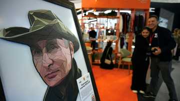 Putin T-shirts, robots and the Taliban -- but few Westerners at Russia's Davos