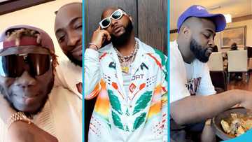 Davido hangs out with Showboy and humbly eats fufu and light soup in his hotel suite in Ghana, fans react