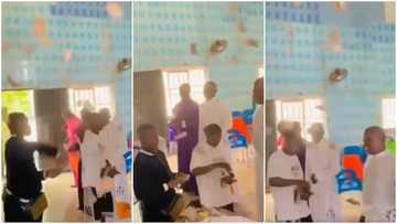 Money talks: Young men spray cash on pastors in church, drop new notes into offering basin, video goes viral