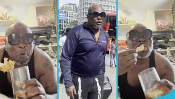 Bukom Banku in the UK, chews fried chicken and a drink, teases his fans in the video