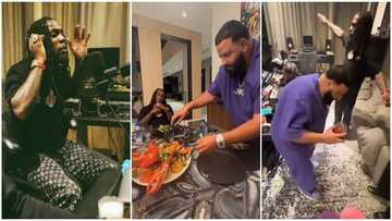 DJ Khaled hosts Burna Boy inside his mansion, personally serves him lobster in video: "Odogwu for a reason"