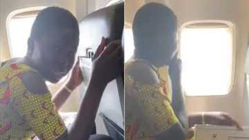 Lady who boards plane for the first time cries intensely while looking out the window (video)
