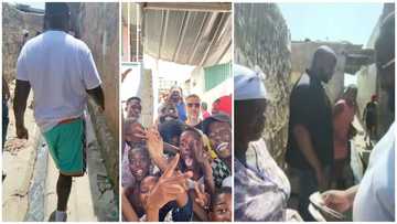 US Music star Rick Ross visits slums, shares money with the needy in video