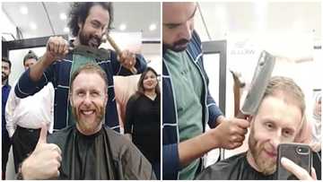 Barber shows skills, uses butcher's knife, broken glass and hammer to cut hair in style