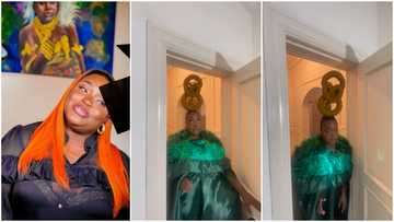 Roselyn Ngissah does huge hairdo; struggles to fit it through doorway