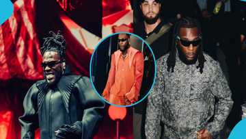 "What is he wearing abi na mistake?" Reactions trail Burna Boy's outfit as he performs in sold-out UK concert