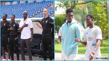 Black Stars Assistant Coach John Paintsil and new player dance as their initiation into the team
