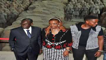 Photos drop as Mugabe's computerized coffin can make family see him on phone after burial
