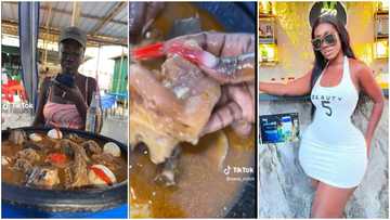 Hajia Bintu eats large bowl of fufu filled with meat and eggs with long nails