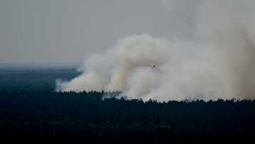 Blasts ring out as fires rage in Berlin forest