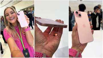 Apple Event: Lady handles new iPhone 15 pink version, operates it, excited about USB-C