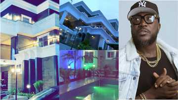 Rapper Nhyiraba Kojo shows he is richer than Shatta Wale as he opens gates of his gigantic mansion with big pool after in new video