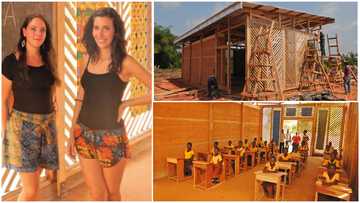 2 architects worked with 20 volunteers to build mud and wood classroom blocks for remote village in Ghana