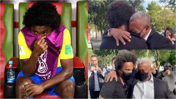 Willian's dad fights back tears as he emotionally hugs winger on his return to Brazil