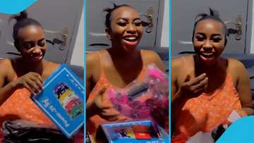 Ghanaian lady gets tambourine and chocolate as Valentine's Day gift, video evokes laughter