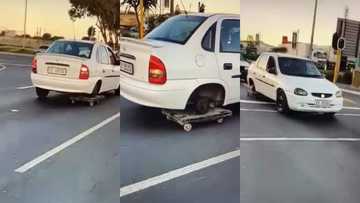 Opel driver uses trolley to replace missing wheel; gets people worried