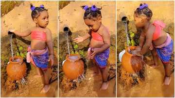 Girl in native wrapper dances while fetching water with clay pot, video of sweet moves goes viral on TikTok