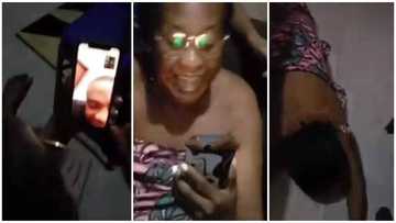 Mum with wrapper screams for joy & lays flat on floor after her son cut his dreadlocks, video causes stir