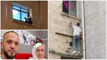 30-year-old son climbs two-storey building every night to watch over his ailing mum