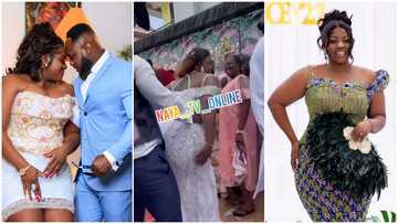 Money flies as Tracey Boakye's husband holds onto her backside as they show incredible dance moves on wedding day