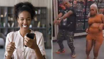 Young man & gorgeous lady show off fire dance moves; many don't even notice the man
