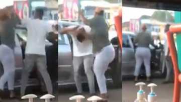 Wife fights cheating husband 'chilling' in town with his side chick, boldly removes lady's wig in video