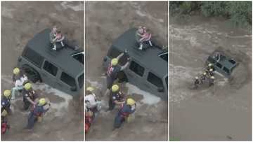 Video Shows Brave Moment Officers Rescue Dad & His Daughters Who Were Stranded on Their Car During Flood