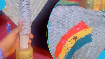 Ghana Movie Award organisers present beautiful woven fan with Ghana flag on it as plaque to winners