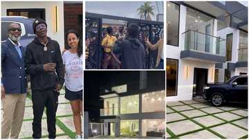 Shatta Wale buys new mansion, sprays money on fans as they mob him while inspecting the building (Video