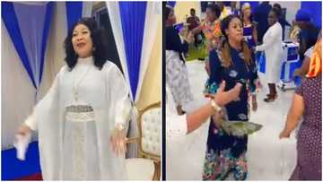 Born again Agradaa spotted in a video praising God in a dashing white dress: Netizens praise her