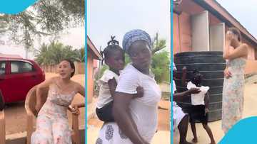 Little Ghanaian girl cries helplessly as a Chinese resident in Ghana tries to carry her