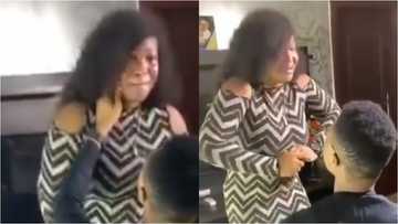 Pretty lady sheds uncontrollable tears of joy as her boyfriend proposes marriage to her in video