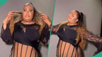 Plus-size lady rocks a breathtaking corseted dress and ponytail hairstyle: "The designer is talented"