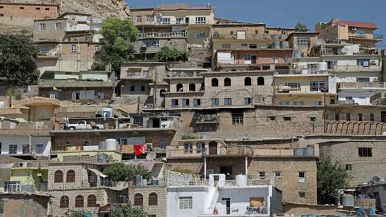 As Iraq concrete jungle swelters, ancient stone houses stay cool