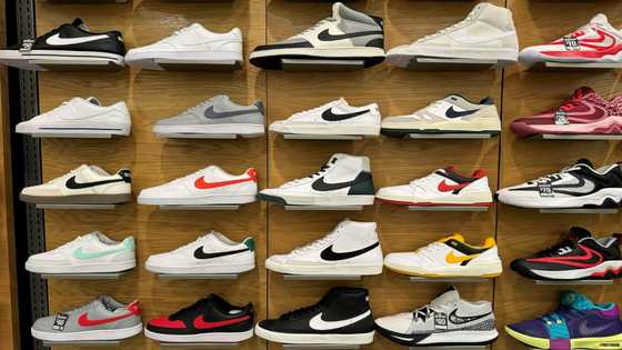 Tepid Nike outlook dents shares as it touts Olympic offerings