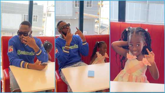 Island Frimpong: Medikal and pretty daughter hang out at Chickenman Pizza joint, video evokes joy