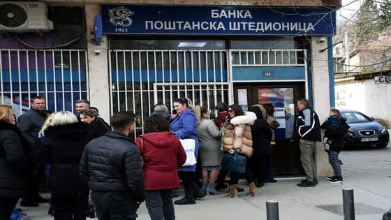 Kosovo's Serbs hit by lines, limited withdrawals after currency ban